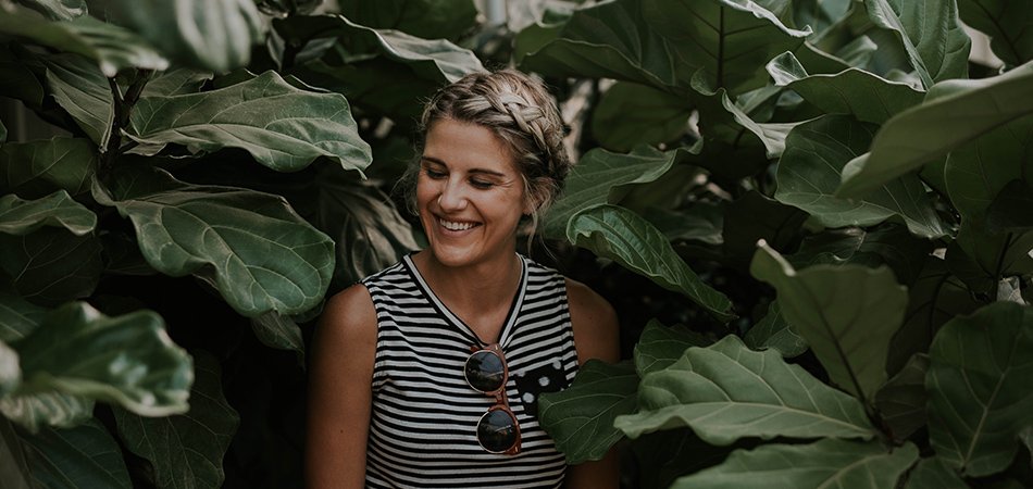 woman among leaves | milk thistle liver cleanse