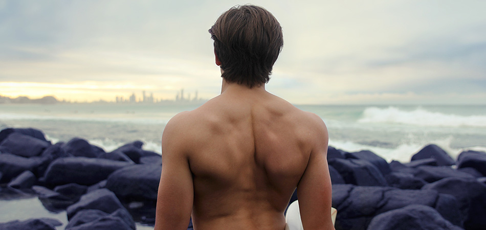 Male surfer with muscles | bodybuilding
