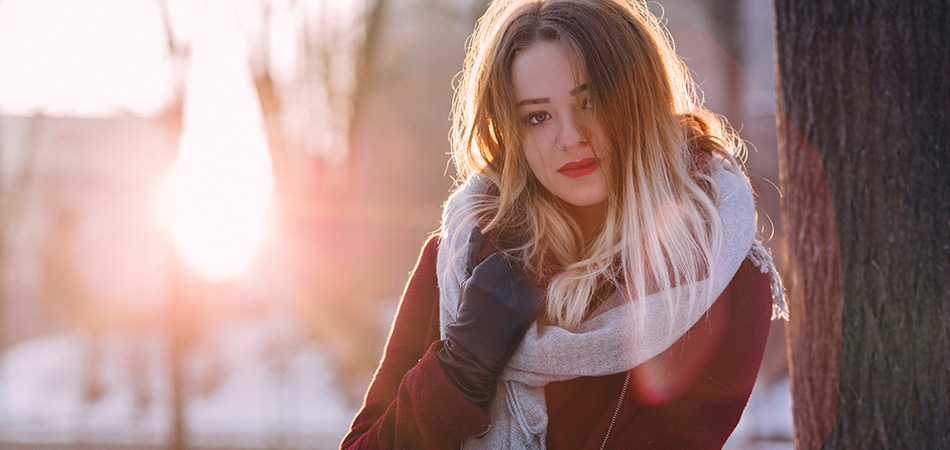 Young woman in warm scarf | avoid a cold