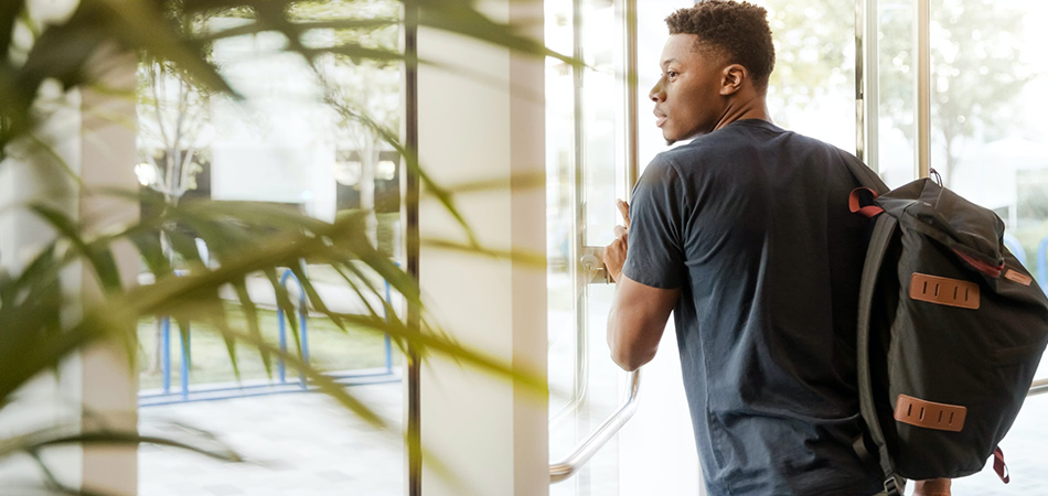 Young man going to university