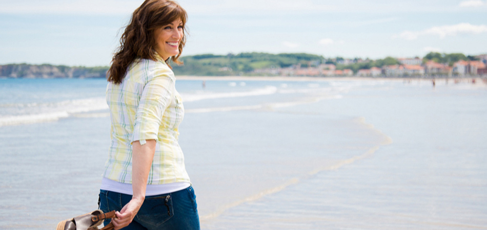 woman on a beach | herbal water retention tablets