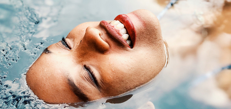 Woman lying in water | ease water retention